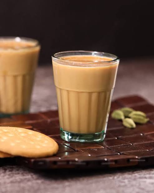 Brewing hot cutting chai in kulhad cup
